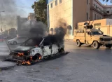 32 people are killed in clashes in Libya before a shaky quiet