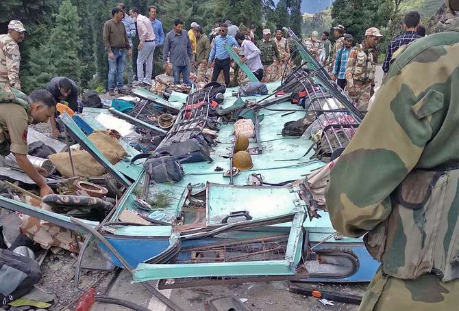 Six Indian policemen are killed as a bus plunges down a gorge in occupied Kashmir