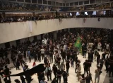 Supporters of Moqtada Sadr stage a sit-in outside a courthouse