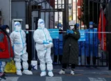 As outbreaks spread, Chinese cities intensify their zero-COVID efforts